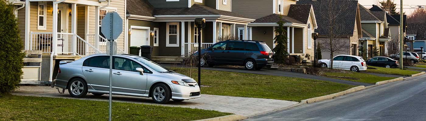 Cars Parked in a Driveway