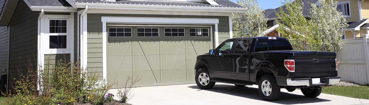 Pickup Truck Parked in Front of a House