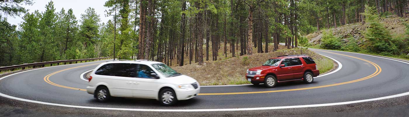 Cars Driving on a Winding Road